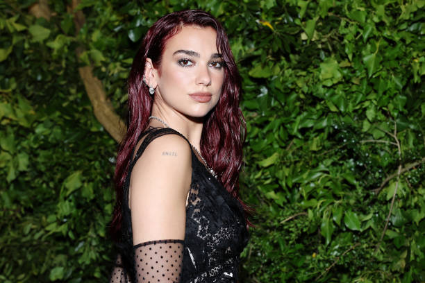 Dua Lipa Attends the 2024 Met Gala Celebrating Sle