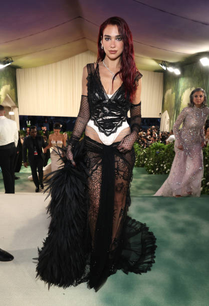 Dua Lipa attends The 2024 Met Gala Celebrating "Sleeping Beauties: Reawakening Fashion" at The Metropolitan Museum of Art on May 06, 2024 in New York City — frame 7/12 (417×612)