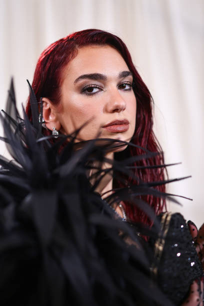 Dua Lipa Attends the 2024 Met Gala Celebrating Sle