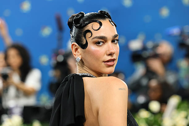 Dua Lipa Attends the 2025 Met Gala Celebrating Sup