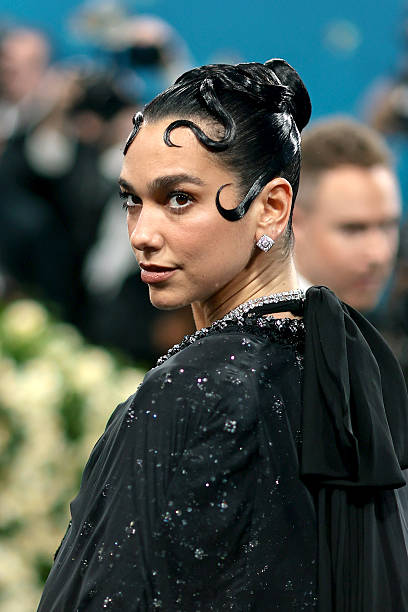 Dua Lipa Attends the 2025 Met Gala Celebrating Sup