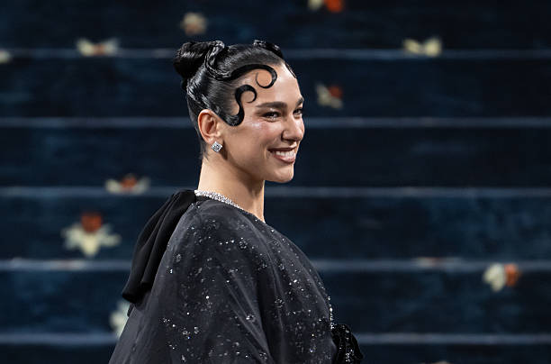 Dua Lipa Attends the 2025 Met Gala Celebrating Sup