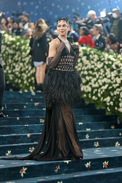Dua Lipa Attends the 2025 Met Gala Celebrating Sup
