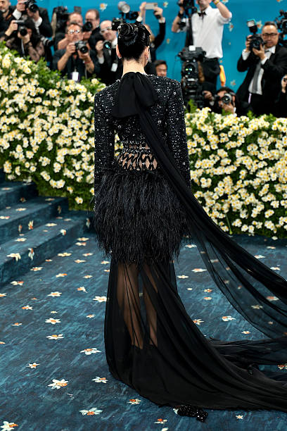Dua Lipa Attends the 2025 Met Gala Celebrating Sup
