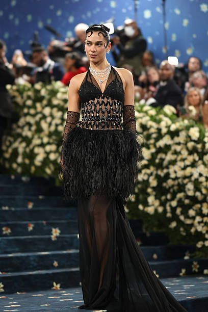 Dua Lipa Attends the 2025 Met Gala Celebrating Sup