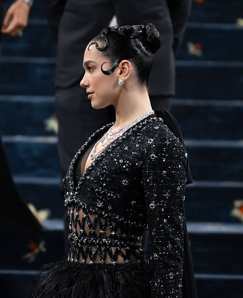 Dua Lipa Attends the 2025 Met Gala Celebrating Sup