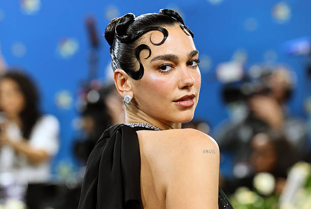 Dua Lipa Attends the 2025 Met Gala Celebrating Sup