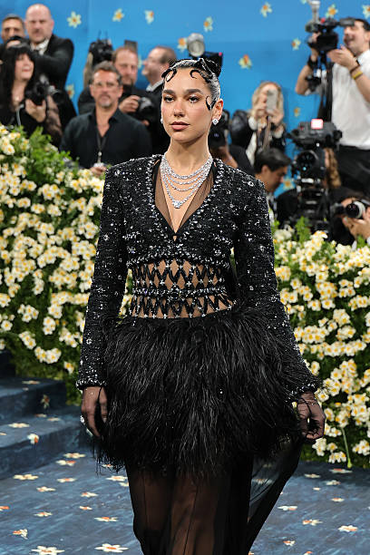Dua Lipa Attends the 2025 Met Gala Celebrating Sup