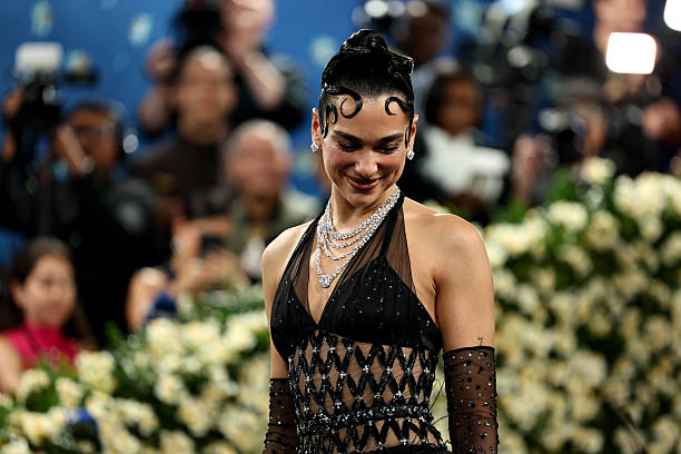 Dua Lipa Attends the 2025 Met Gala Celebrating Sup