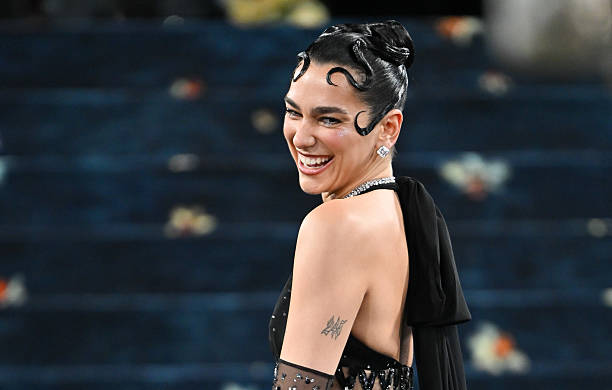 Dua Lipa Attends the 2025 Met Gala Celebrating Sup