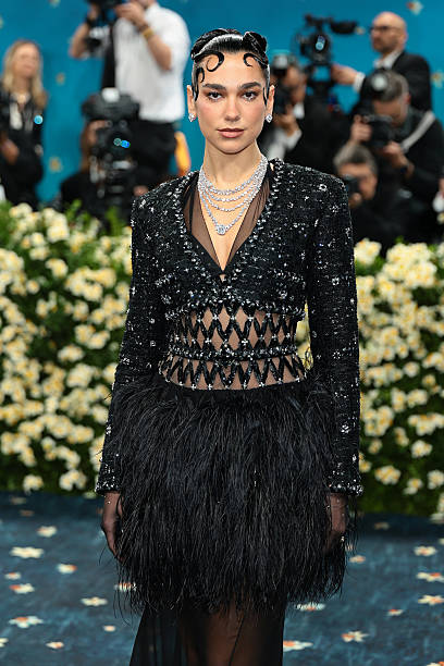 Dua Lipa Attends the 2025 Met Gala Celebrating Sup