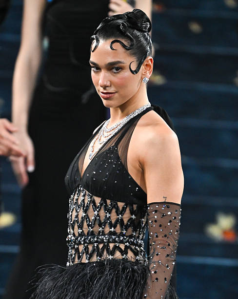 Dua Lipa Attends the 2025 Met Gala Celebrating Sup