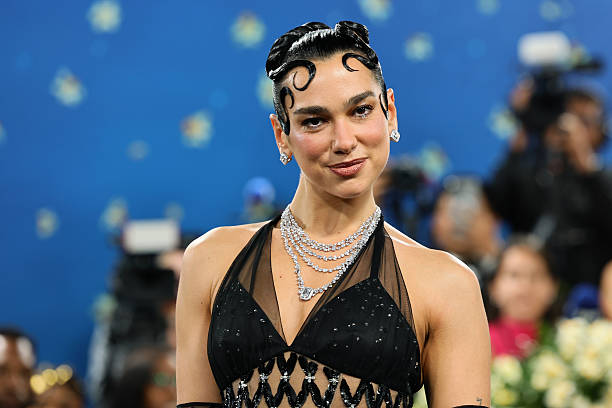 Dua Lipa Attends the 2025 Met Gala Celebrating Sup