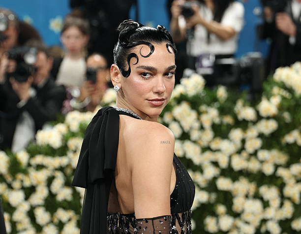Dua Lipa Attends the 2025 Met Gala Celebrating Sup