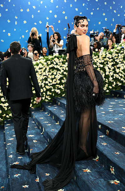 Dua Lipa Attends the 2025 Met Gala Celebrating Sup
