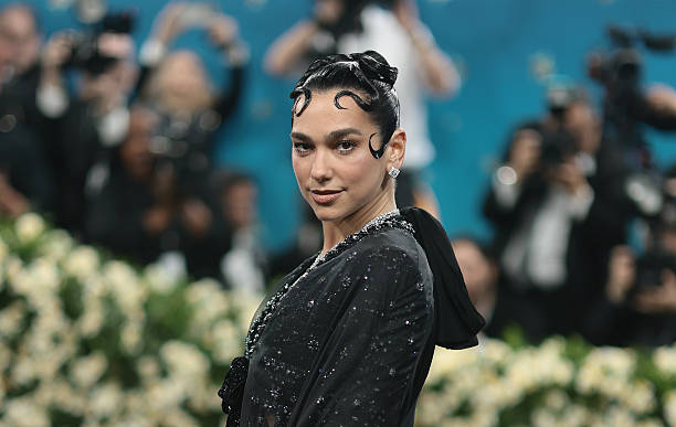 Dua Lipa Attends the 2025 Met Gala Celebrating Sup