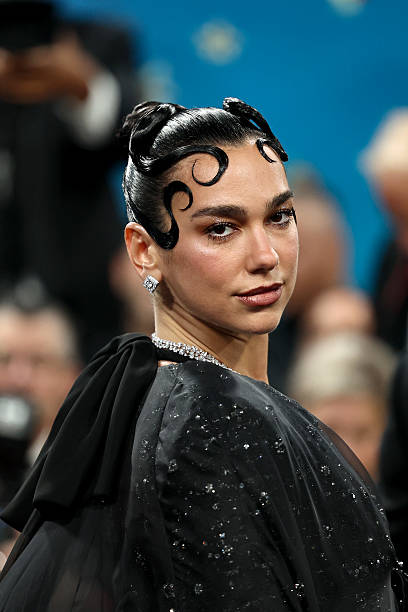 Dua Lipa Attends the 2025 Met Gala Celebrating Sup
