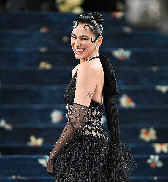 Dua Lipa Attends the 2025 Met Gala Celebrating Sup
