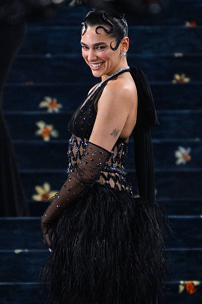 Dua Lipa Attends the 2025 Met Gala Celebrating Sup