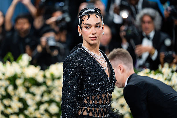 Dua Lipa Attends the 2025 Met Gala Celebrating Superfine