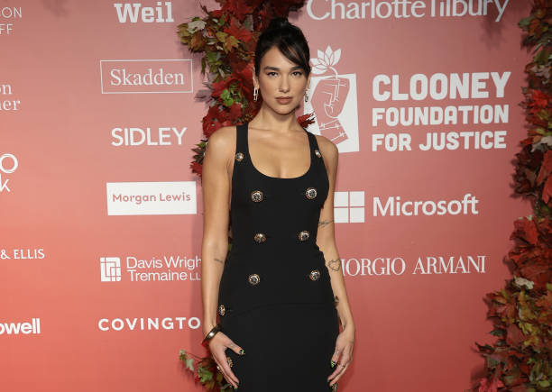 Dua Lipa Attends the Clooney Foundation for Justic