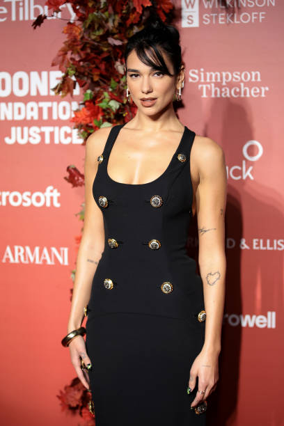 Dua Lipa Attends the Clooney Foundation for Justic