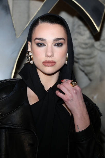 Dua Lipa attends the Saint Laurent Womenswear Fall Winter 2023-2024 show as part of Paris Fashion Week on February 28, 2023 in Paris, France — frame 4/8 (408×612)