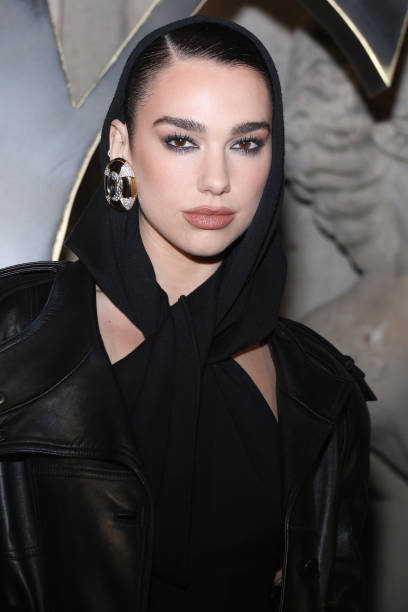 Dua Lipa attends the Saint Laurent Womenswear Fall Winter 2023-2024 show as part of Paris Fashion Week on February 28, 2023 in Paris, France — frame 5/8 (408×612)