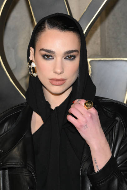 Dua Lipa attends the Saint Laurent Womenswear Fall Winter 2023-2024 show as part of Paris Fashion Week on February 28, 2023 in Paris, France — frame 7/8 (408×612)