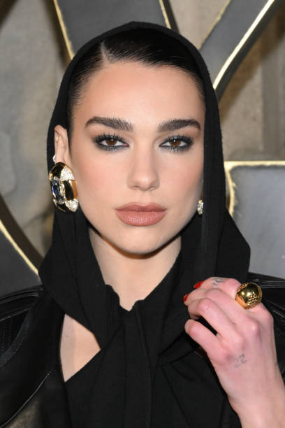 Dua Lipa attends the Saint Laurent Womenswear Fall Winter 2023-2024 show as part of Paris Fashion Week on February 28, 2023 in Paris, France — frame 8/8 (408×612)