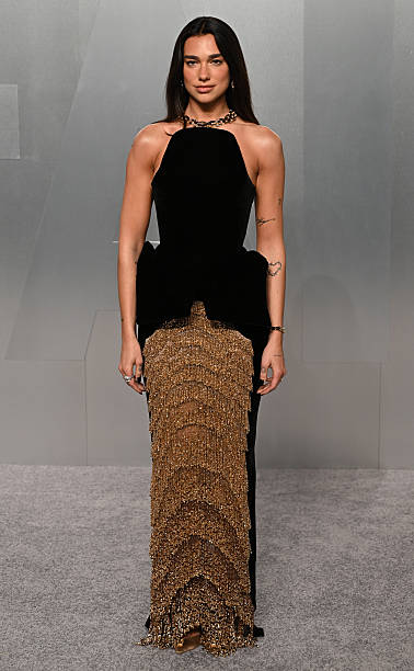 Dua Lipa attends the Vanity Fair Oscar Party held at Los Angeles County Museum of Art in Beverly Hills, Los Angeles, California, USA. Picture date: Sunday March 15, 2026 — frame 100/107 (378×612)