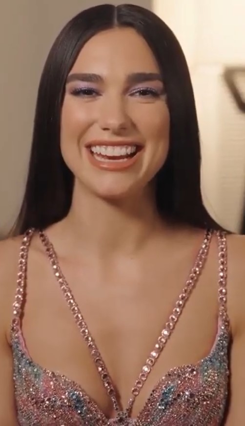 Dua Lipa in an interview for Warner Music in 2021 (502×870)