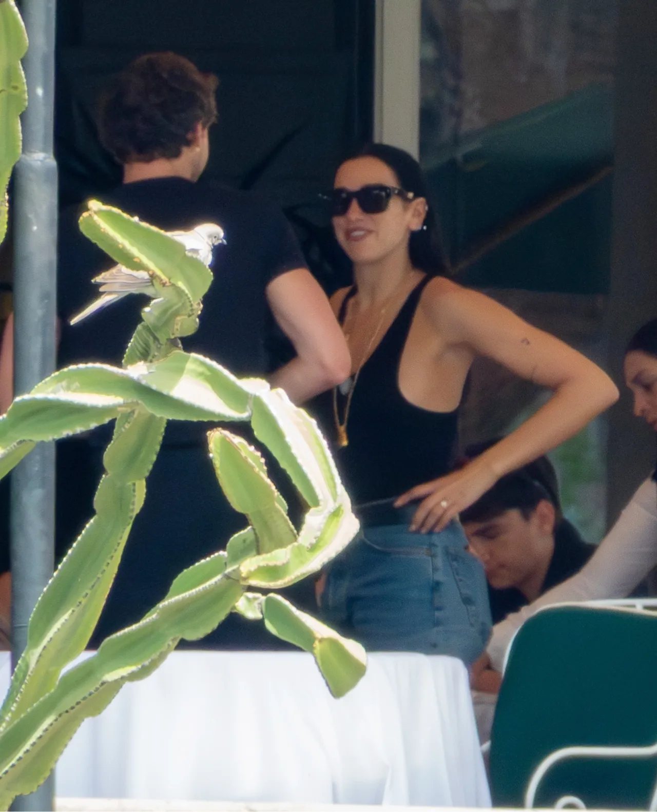Dua Lipa in Black Bodysuit and Denim for Palermo