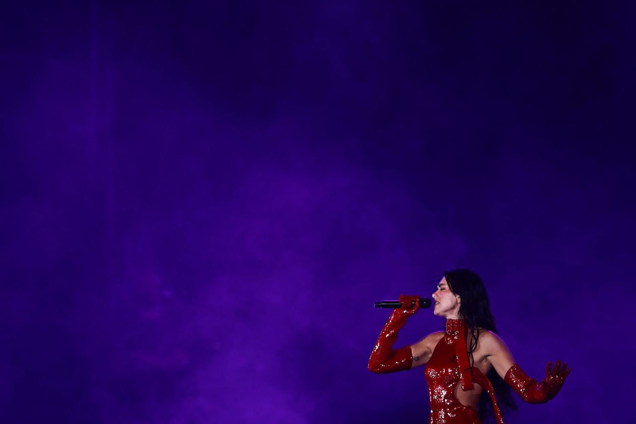 Dua Lipa in Bold Stage Looks at Radical Optimism