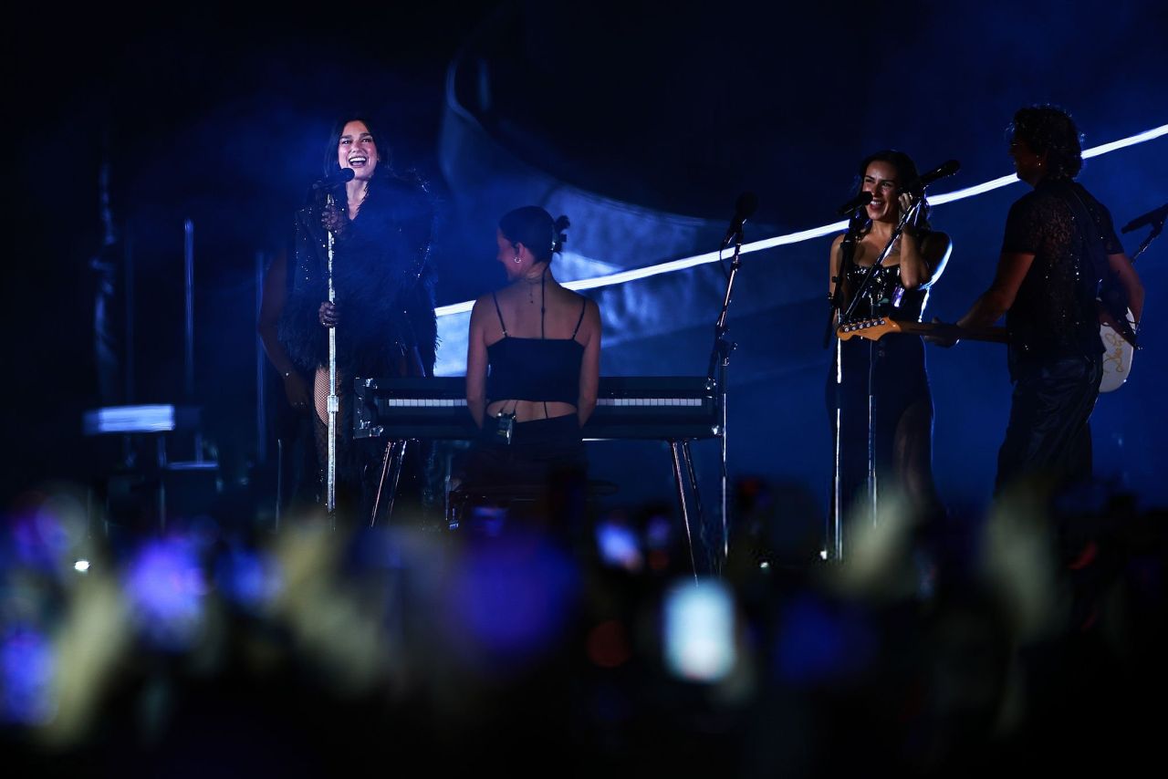 Dua Lipa in Bold Stage Looks at Radical Optimism