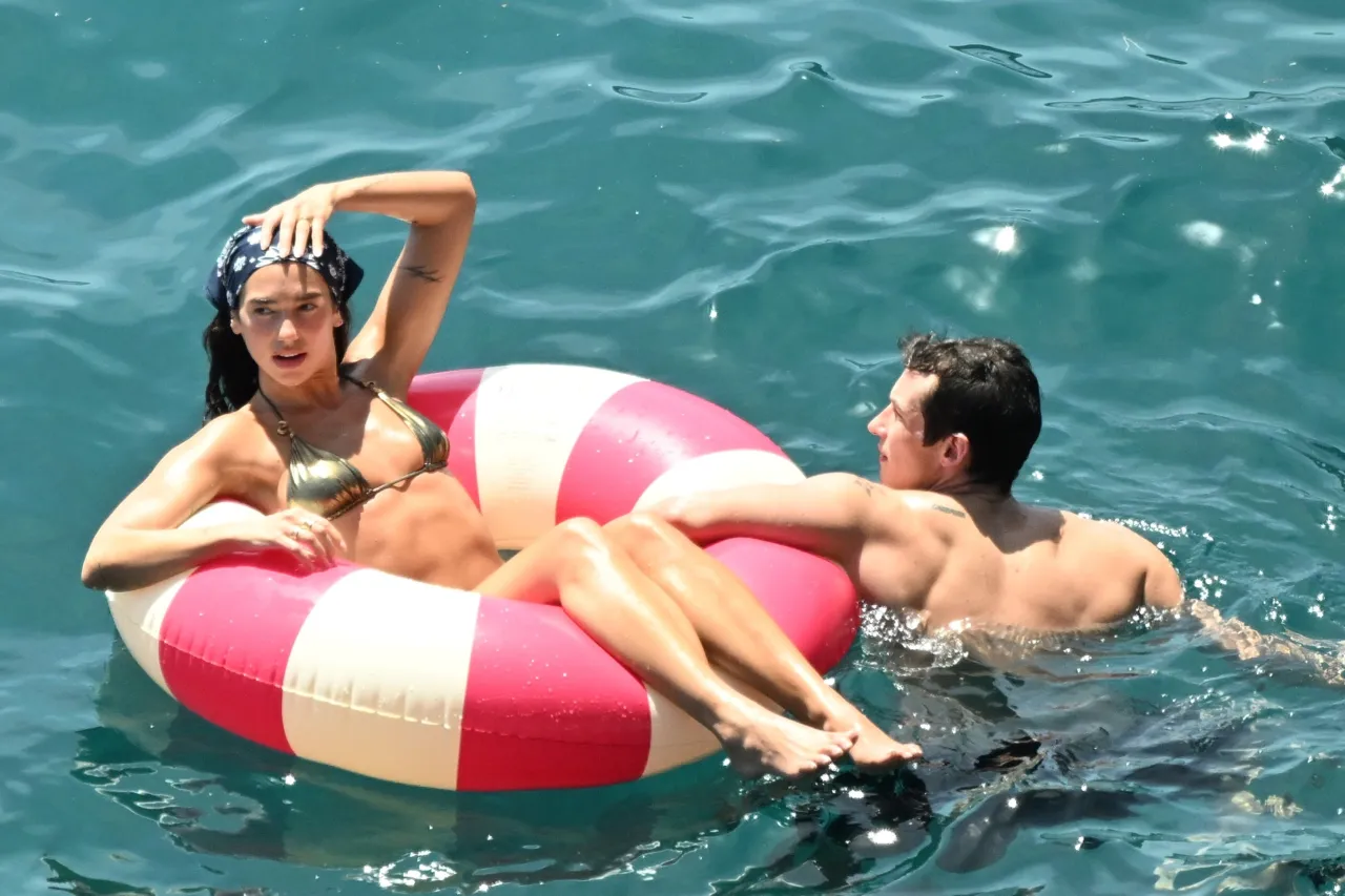Dua Lipa in Gold Bikini on Taormina Sea Float June (1280×853)
