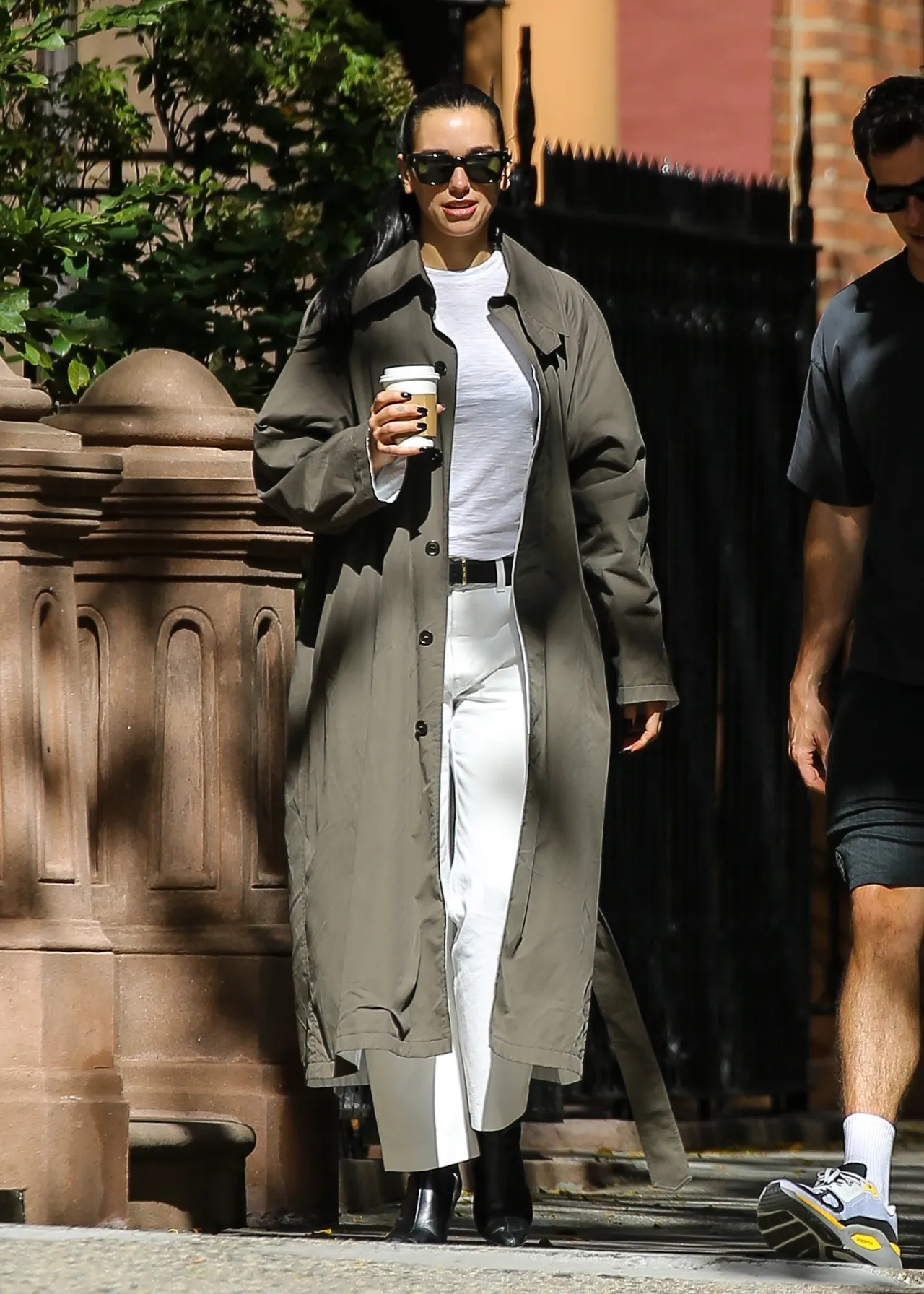 Dua Lipa in Phoebe Philo Sage Trench and White Tro