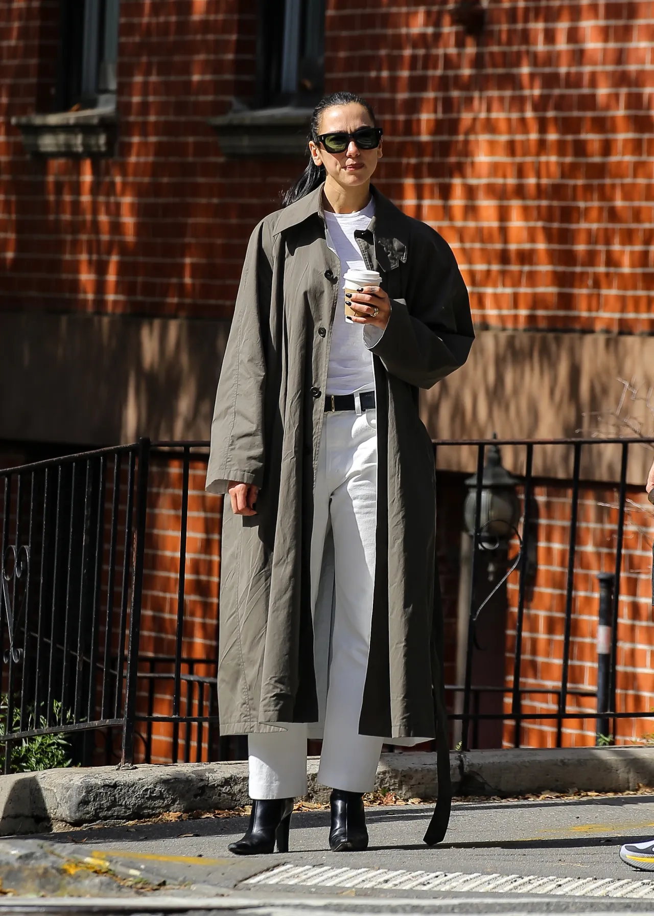 Dua Lipa in Phoebe Philo Sage Trench and White Tro