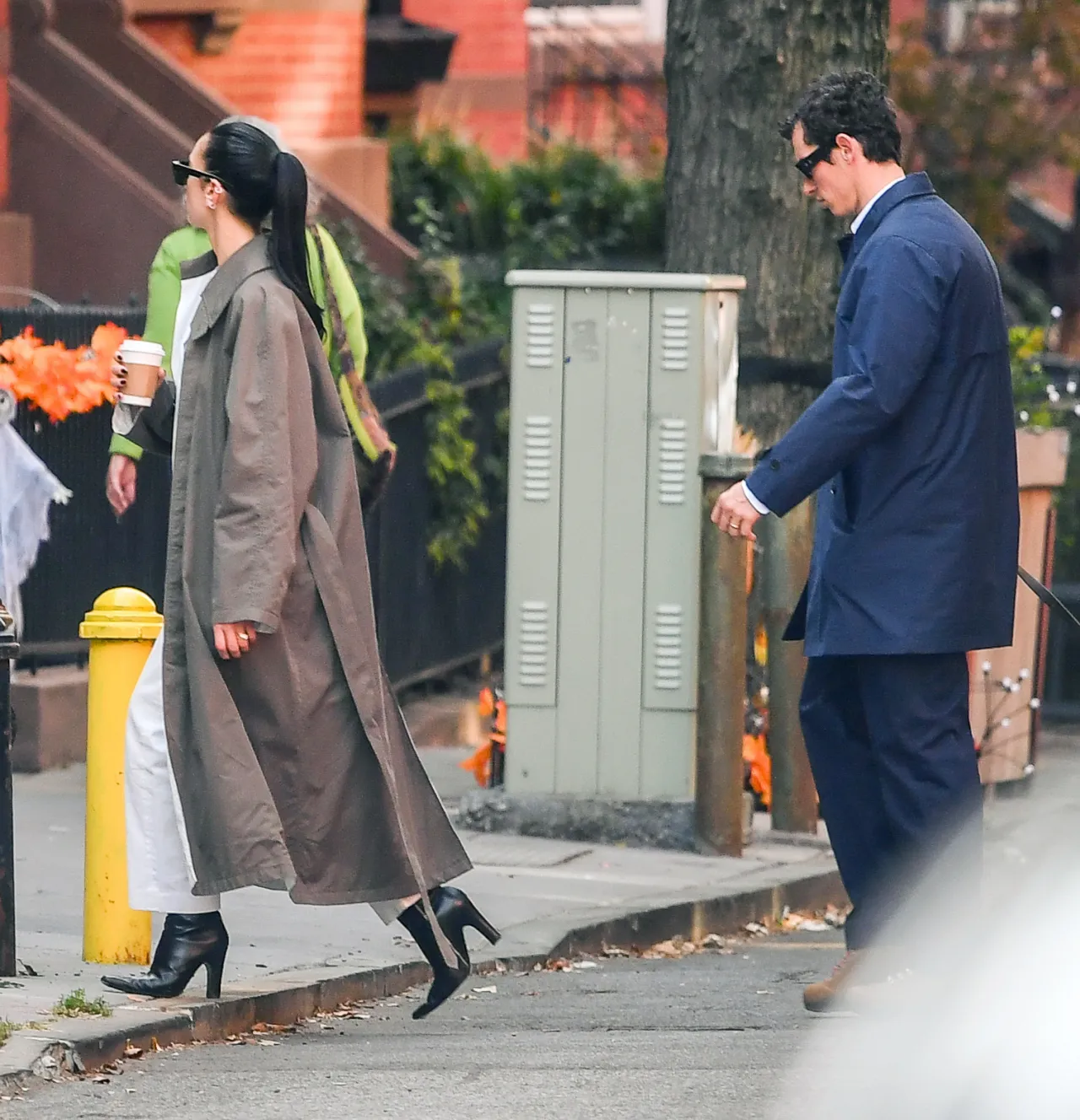 Dua Lipa in Phoebe Philo Sage Trench and White Tro