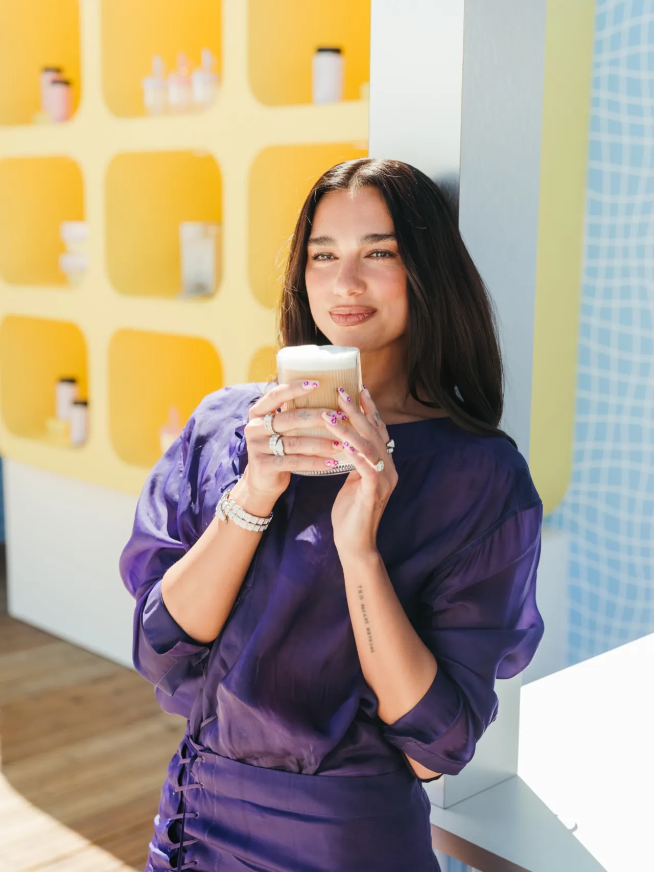 Dua Lipa in Purple for Nespresso Vertuo World May