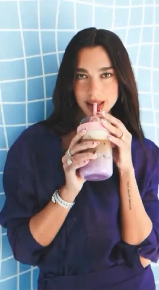 Dua Lipa in Purple for Nespresso Vertuo World May