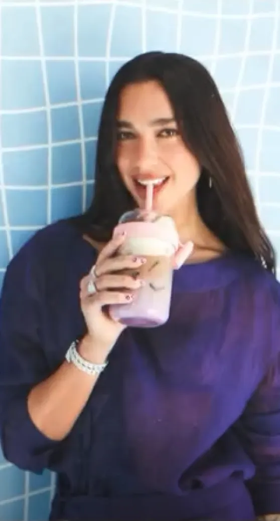 Dua Lipa in Purple for Nespresso Vertuo World May
