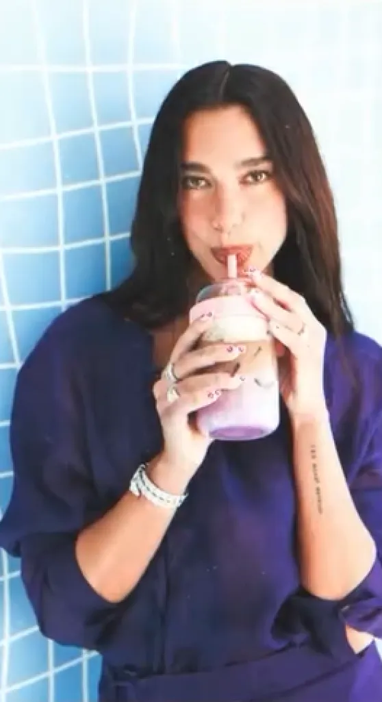 Dua Lipa in Purple for Nespresso Vertuo World May