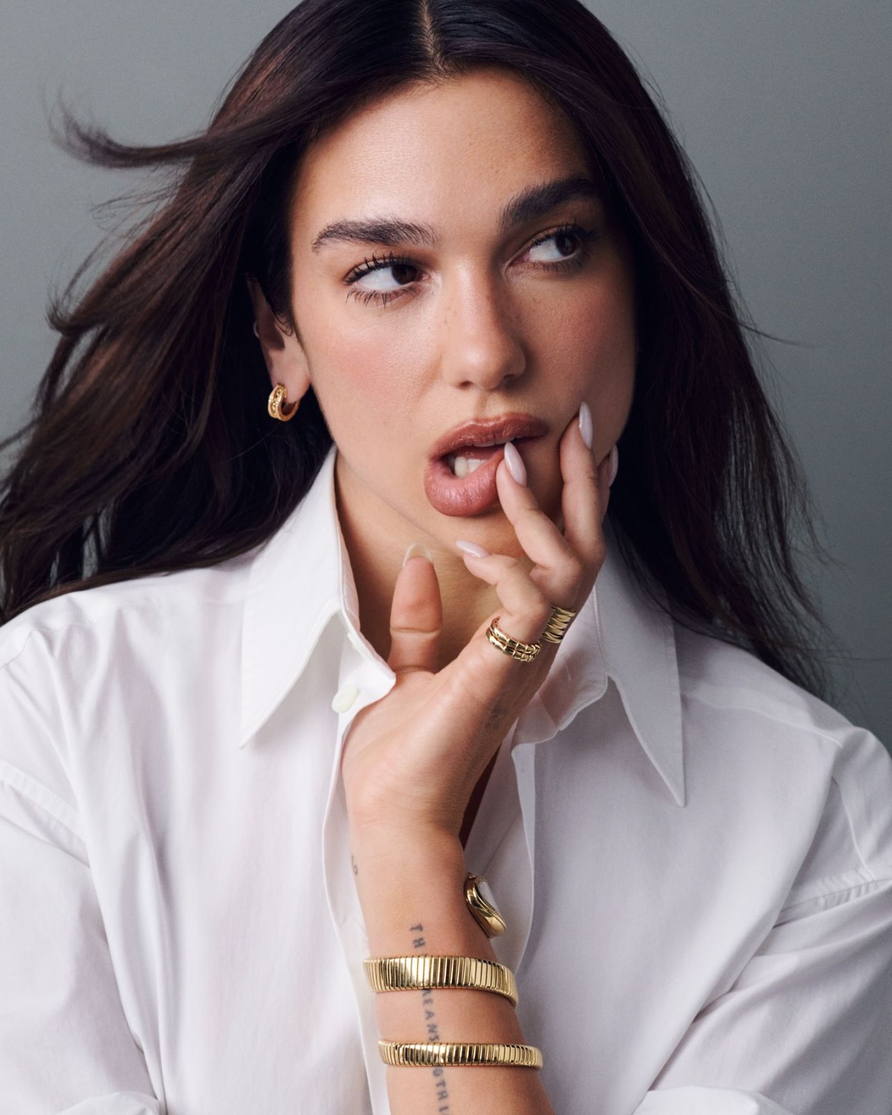 Dua Lipa in Relaxed White Shirt and Jeans for Bvlgari Photoshoot 2026 (1280×1600)