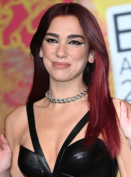 March 2024...The BRIT Awards arrivals 2024 held at The Magazine London, 11 Ordnance Cres, London....Here: Dua Lipa — frame 5/8 (455×612)