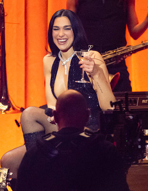 Dua Lipa performs on stage during The BRIT Awards 2026 at Co-op Live on February 28, 2026 in Manchester, England — frame 7/9 (476×612)