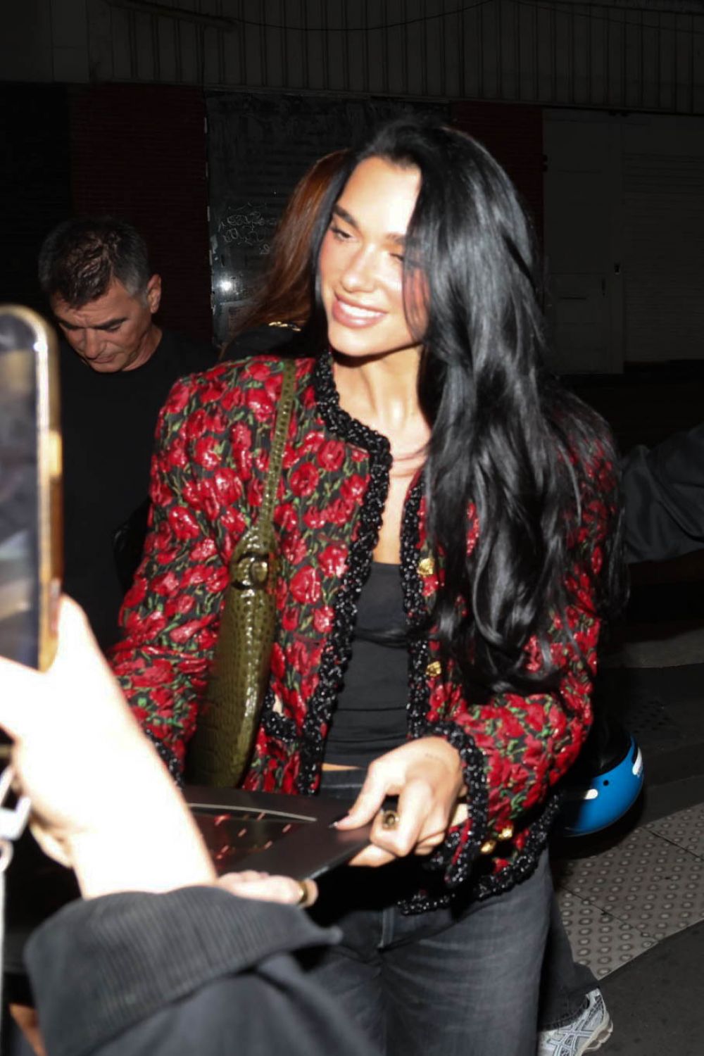 Dua Lipa Stops to Sign Some Autographs Out and Abo