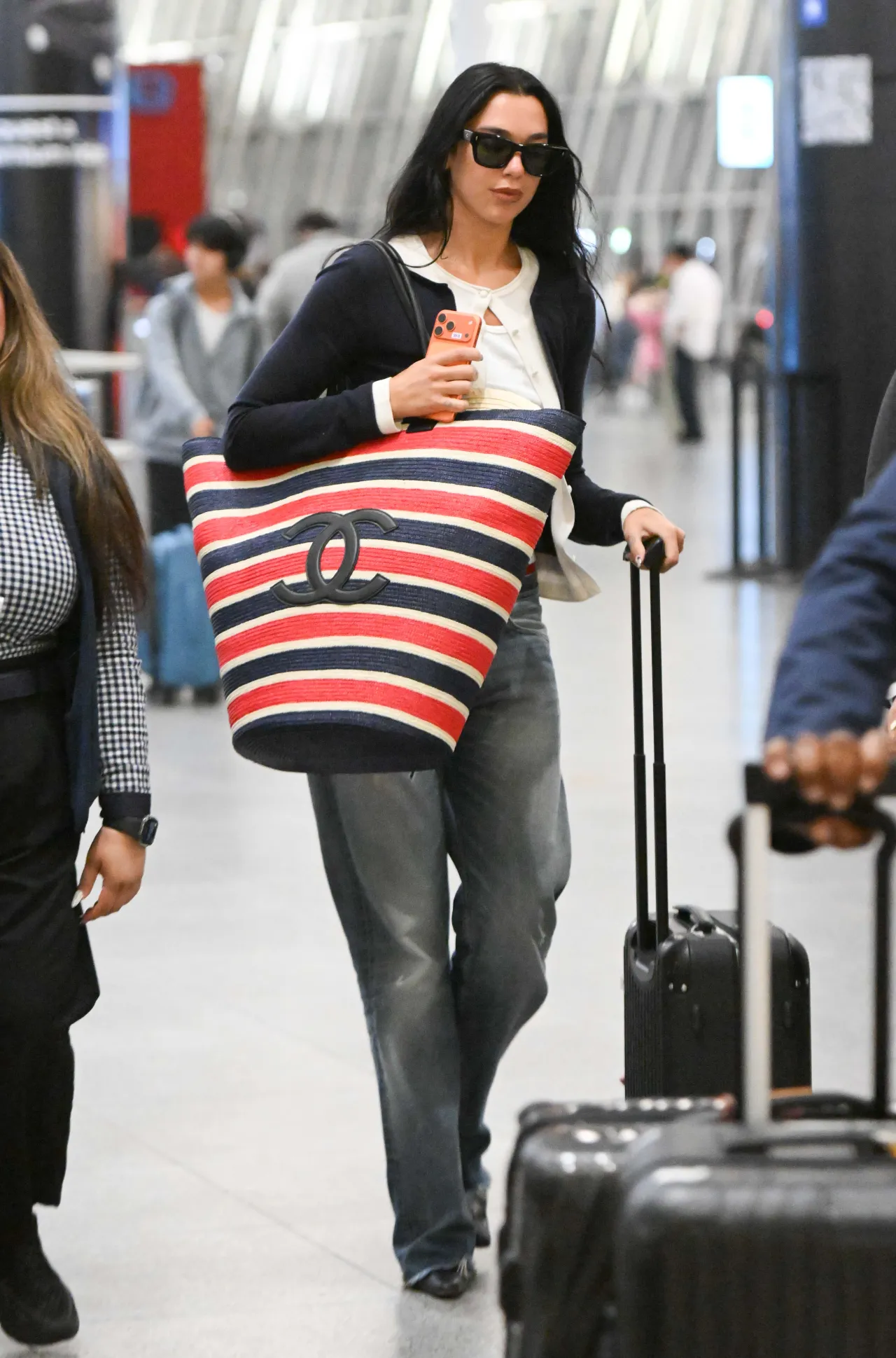 Dua Lipa Wears Martine Rose Jeans with a Chanel