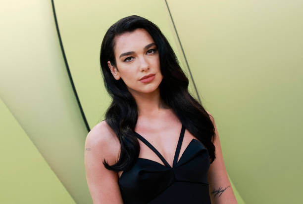 English singer-songwriter Dua Lipa arrives for the Versace Fall/Winter 2023 fashion show on March 9 at the Pacific Design Center in West Hollywood, California.