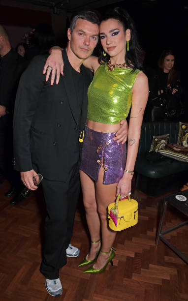 Jacob K and Dua Lipa attend an exclusive party hosted by Frieze and Versace to celebrate London's creative community at Toklas on October 15, 2021 in London, England — frame 20/20 (382×612)
